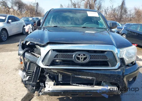 2015 Toyota Tacoma Base V6 z USA, uszkodzony, nr VIN 3TMLU4EN8FM183330